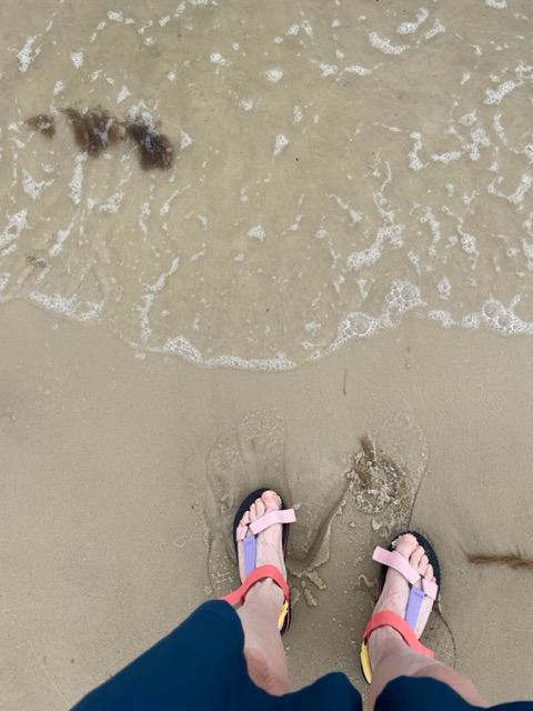 My feet, waiting for the Gulf of Mexico to get them wet!  Photo taken by and the property of FourWalls.