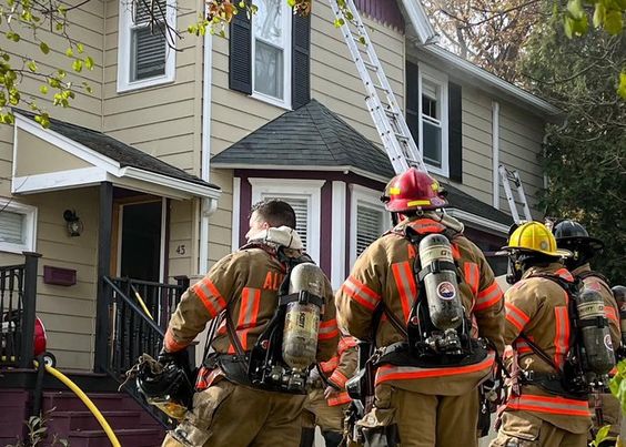 Firefighters in Auburn New York rescue two dogs who were inside of a burning home.