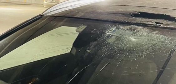 Windshield damage from a light pole that struck Jessica Valov on I-25
