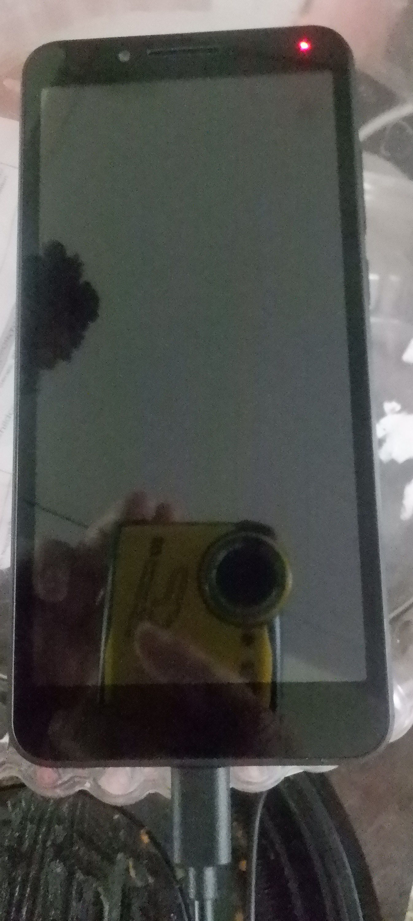 Photo I took of my old phone when I got it--it's exactly the same as my new phone
