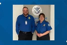William Brand (L) and TSA employee Marie Benny