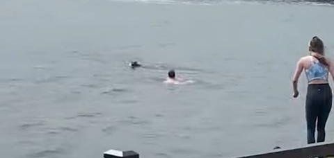 Cole Franchi on the way to rescue a dog that jumped into the Hudson River Cole Franchi on the way to rescue a dog that jumped into the Hudson River