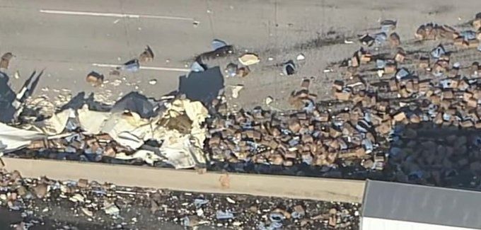 Boxes of raisins spilled on a freeway in California