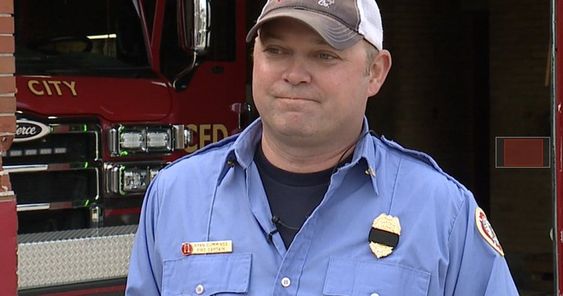Kansas City Firefighter doing his work saving lives. Kansas City Firefighter doing his work saving lives.