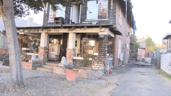 Neighbors in California helping a senior homeowner to improve her property