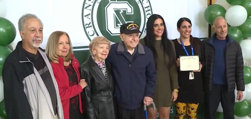 World War II veteran Anthony Simeone receives his high school diploma in R I