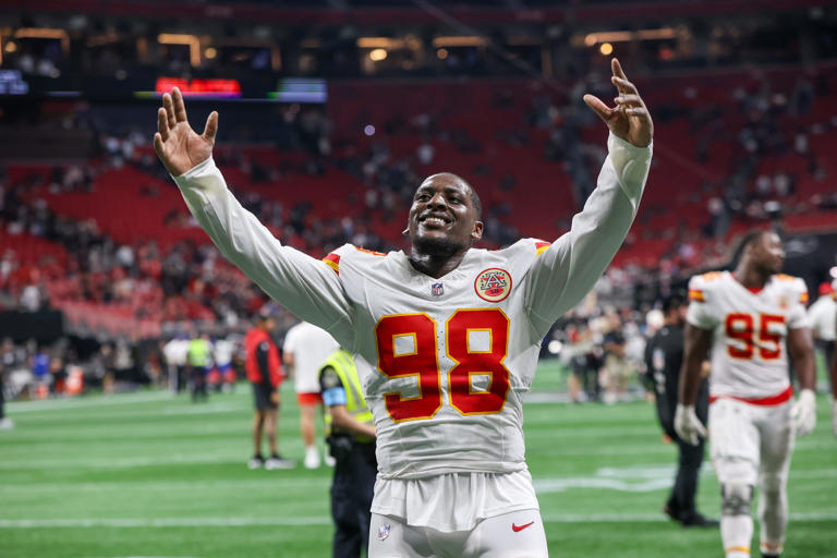 Kansas City Chiefs lineman Tershawn Wharton saves a child who fell over a railing inside of a football stadium.