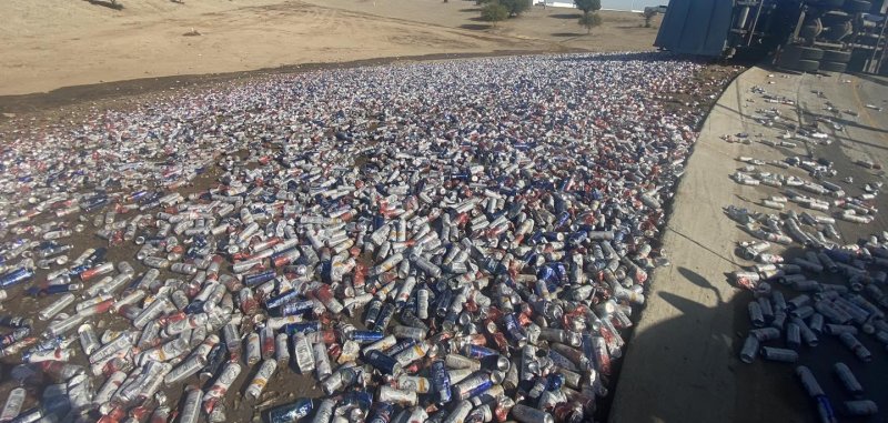 Truck accident in Glendale Arizona with empty cans on a highway. Truck accident in Glendale Arizona with empty cans on a highway.