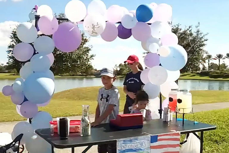 Charlie Allsup has a lemonade stand to raise funds for the relatives of a deceased officer.  