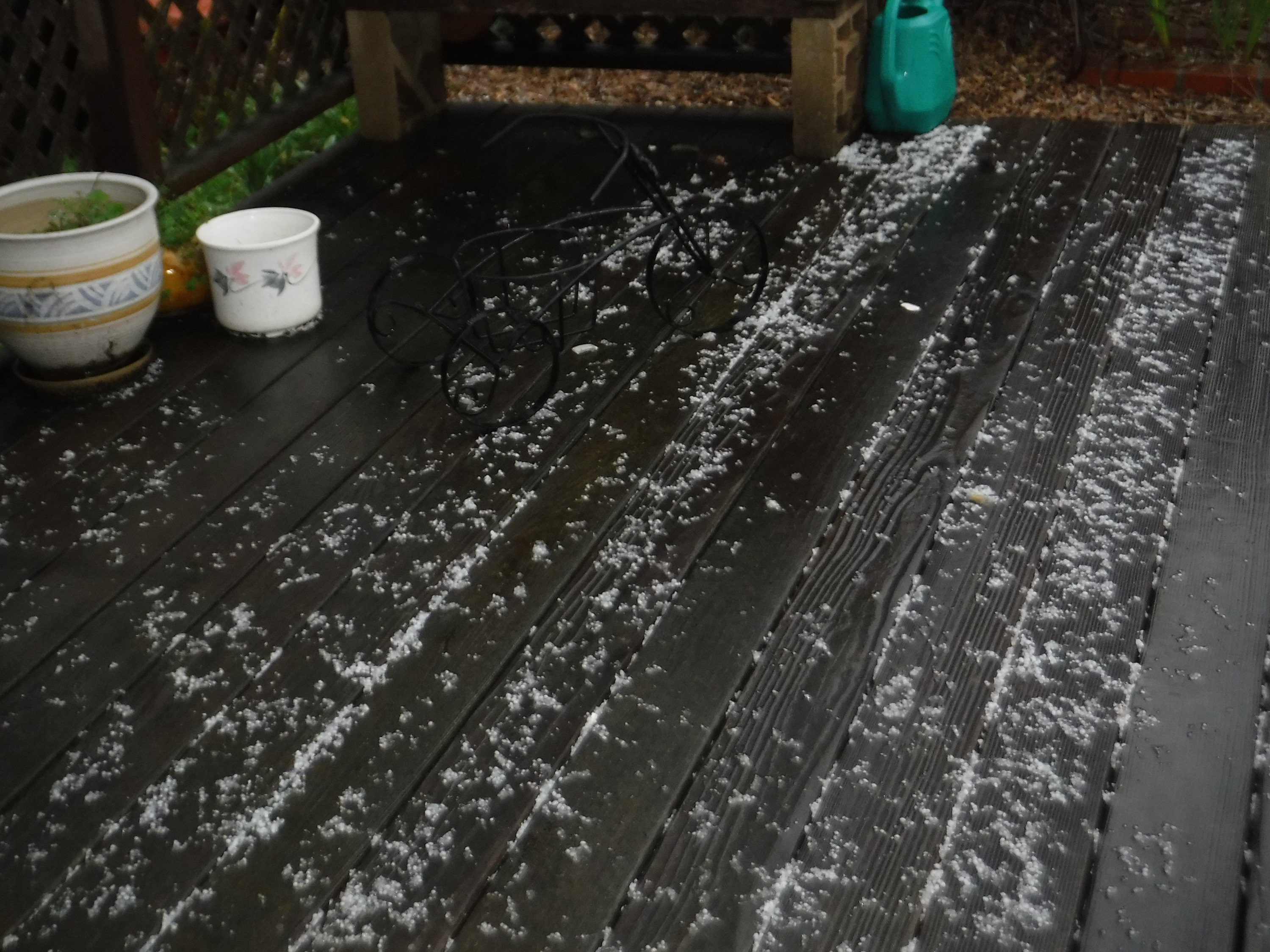 Photo of hail on the deck back at my house Photo of hail on the deck back at my house