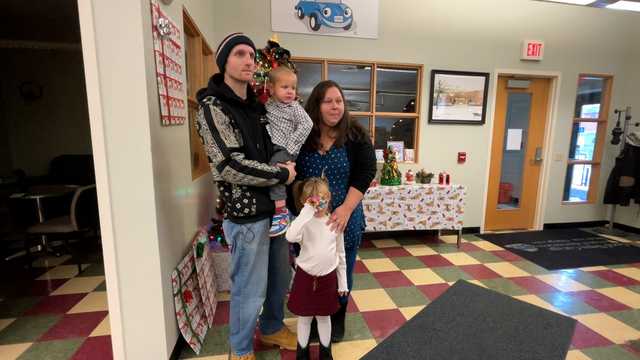 A family in Burlington Vermont receive a new auto from a charity.