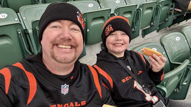 Cincinnati Bengals fans Sammy Stickler (L) and his son Aiden.