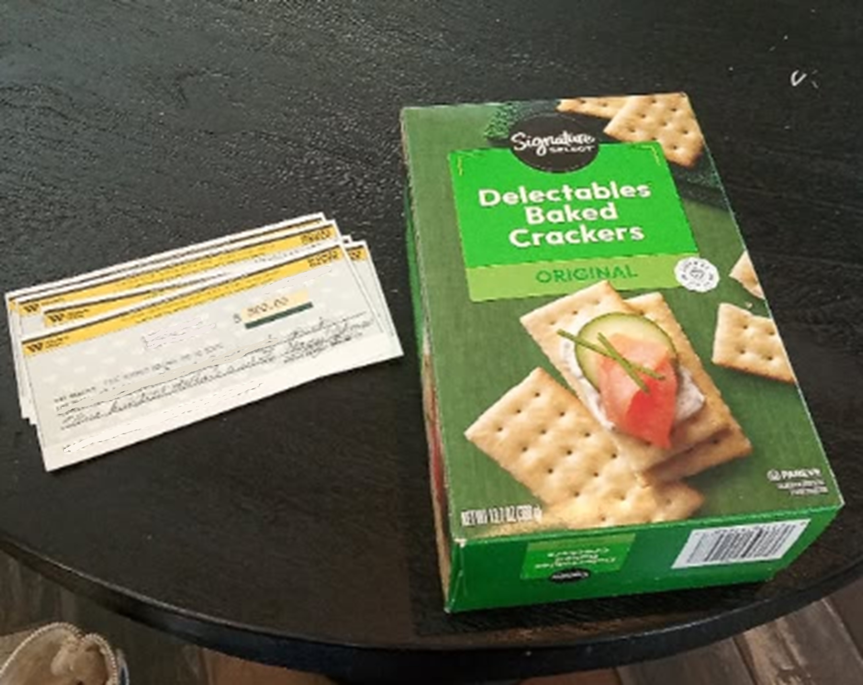 Photo I took of the money orders and crackers I got at the grocery store Photo I took of the money orders and crackers I got at the grocery store