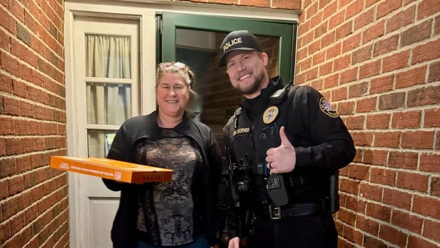 A police officer delivering a pizza to a customer in Tennessee 