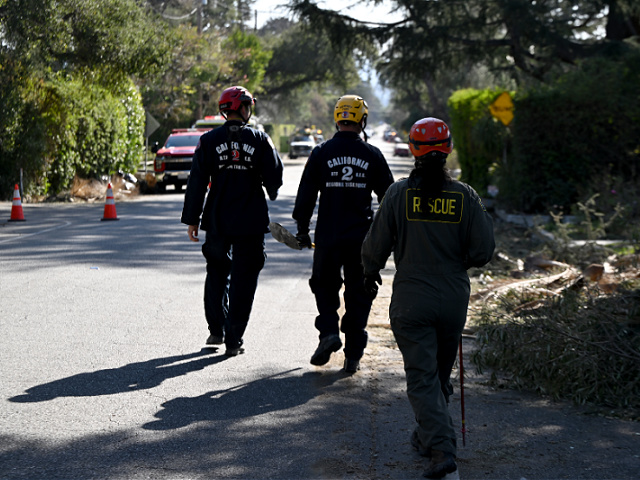 Firefighters in California after the Palisades fire.