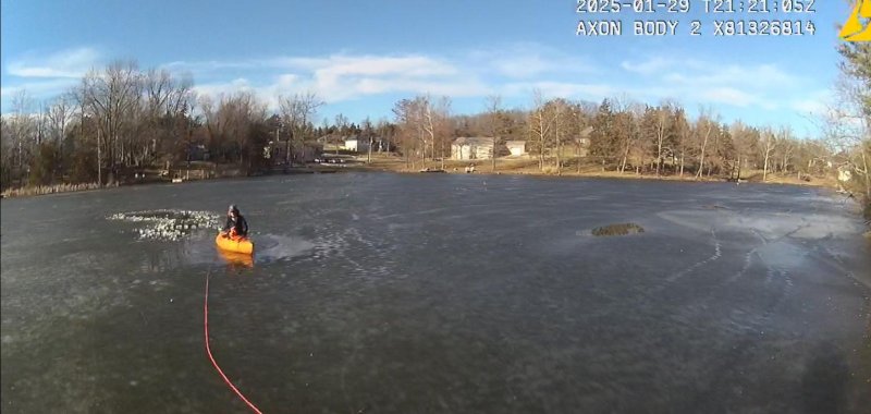 Police in Missouri rescue a woman and a dog trapped aboard a kayak