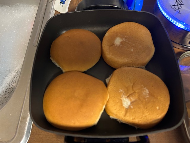 Hamburger buns in a skillet.  Photo taken by and the property of FourWalls.