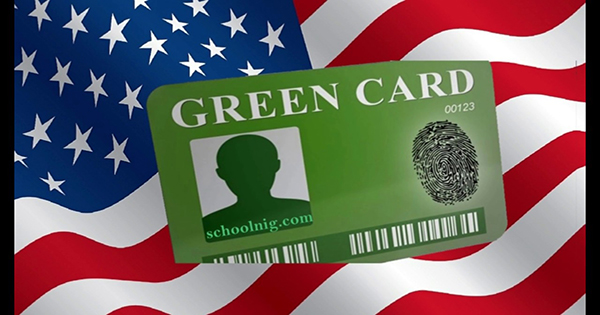 An image showing a Green Card and US Flag. Source: OYA Opportunities website