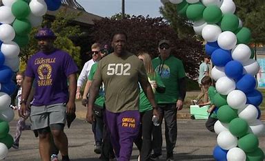 Citizens of Louisville Kentucky walk for a charity.