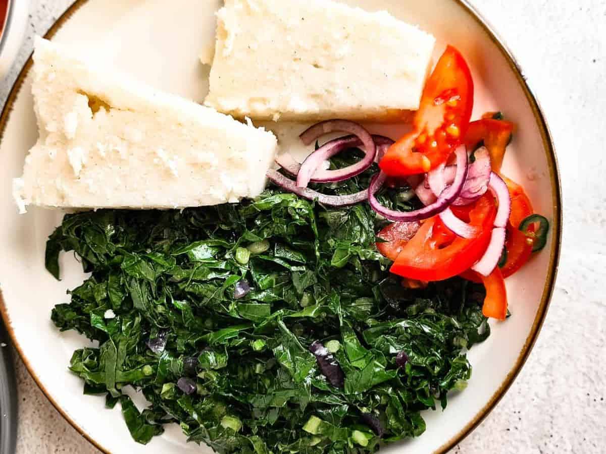 A plate of Ugali & Sukuma wiki - a common household dish in Kenya. Photo: WeEatAtLast website