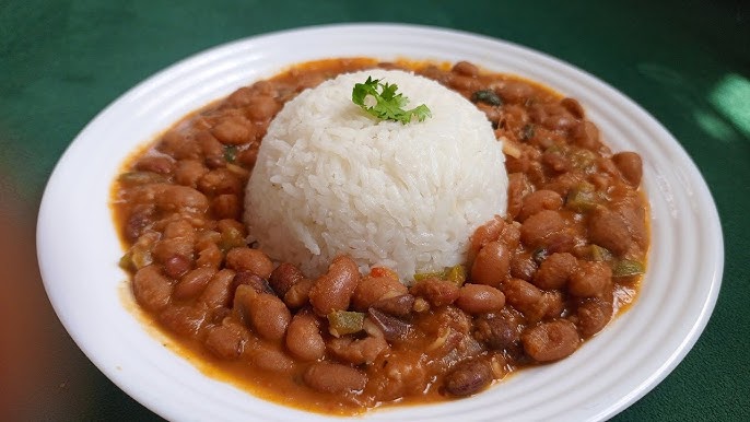 An image of Beans stew served with white rice
