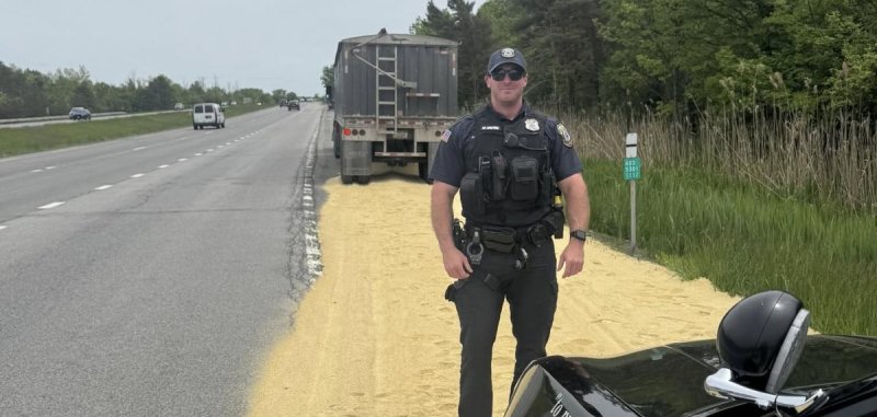WSPD officer in New York state at a site of a soybean powder spill on a highway.