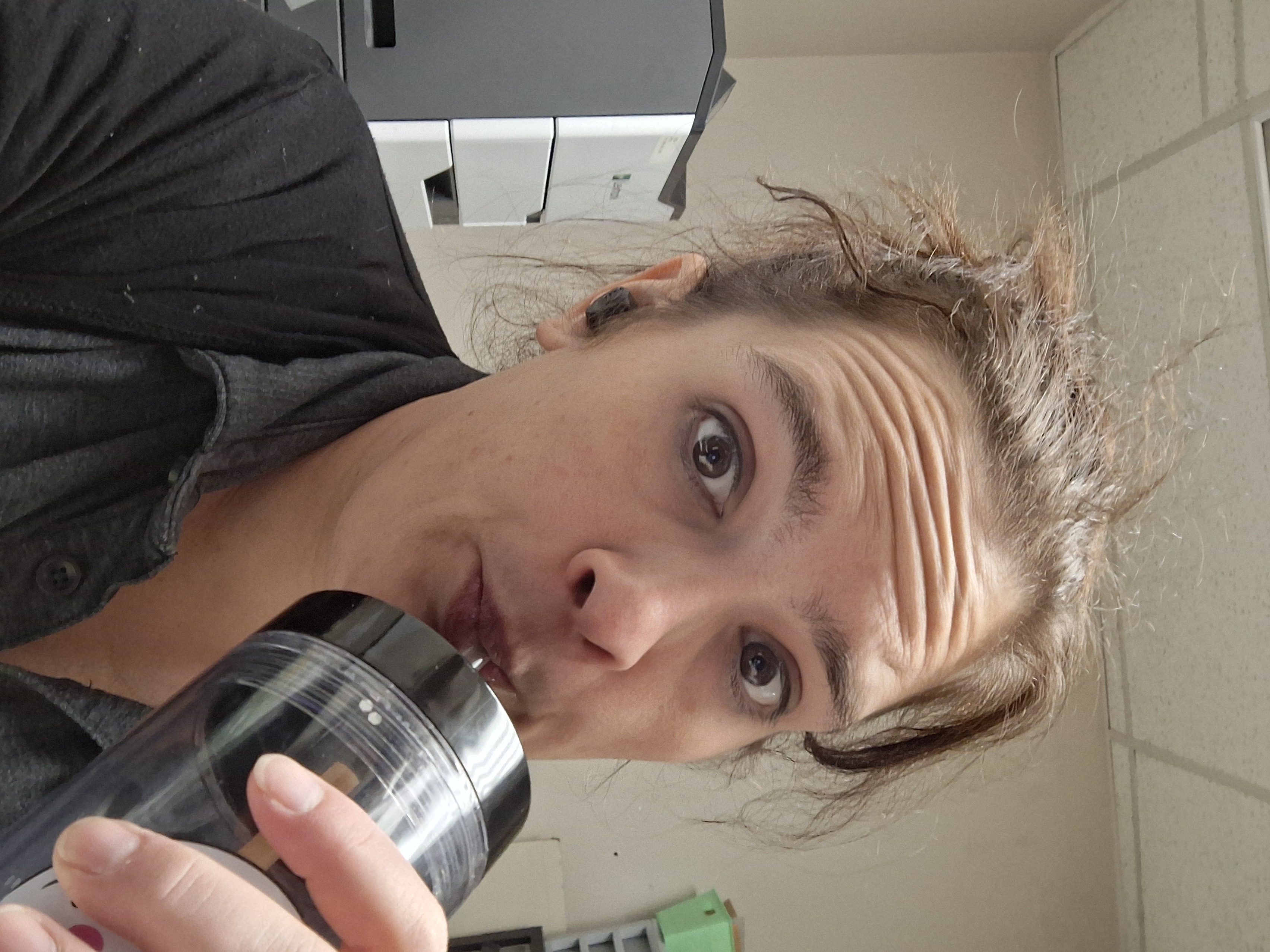 Me at work, exhausted.  About to go look for missing signs 