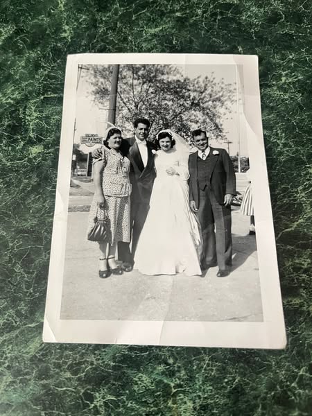 Wedding photo that was found in a book in Sterling Heights Michigan returned.