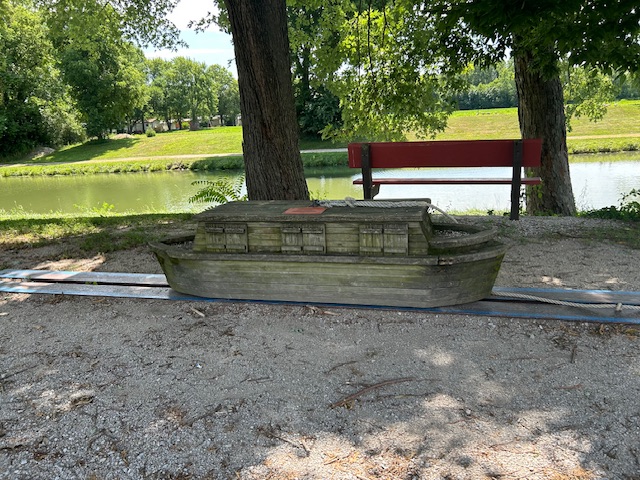 Replica of a canal boat, with a rope to show how heavy the load was.  Photo taken by and the property of FourWalls.