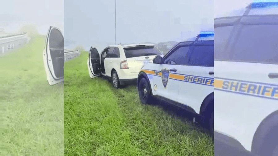 Jacksonville Police officer assist a SUV stranded on a road in Florida.
