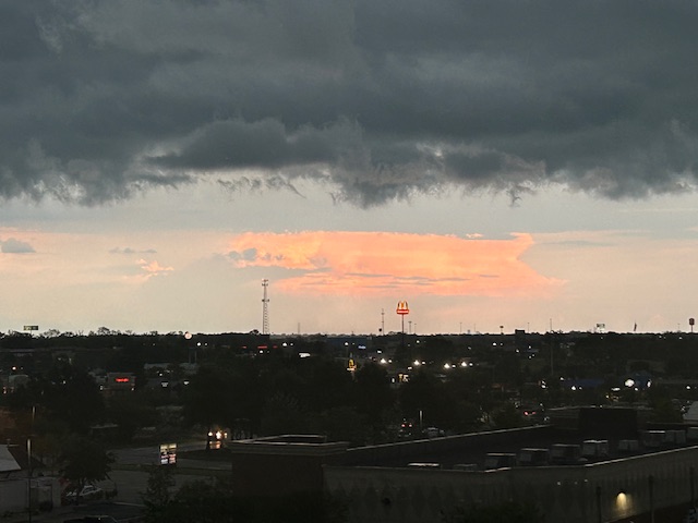 Storm moving in during a sunset.  Photo taken by and the property of FourWalls.