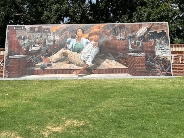 Photo of Michael Rosato’s mural commemorating the anguish of the 1921 Tulsa Race Riot.  Photo taken by and the property of FourWalls.