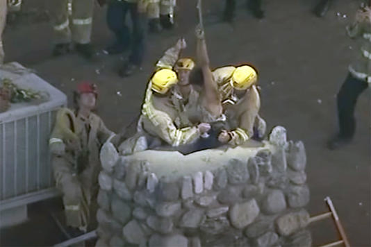 LAFD rescues a woman who fell into a chimney in San Fernando California