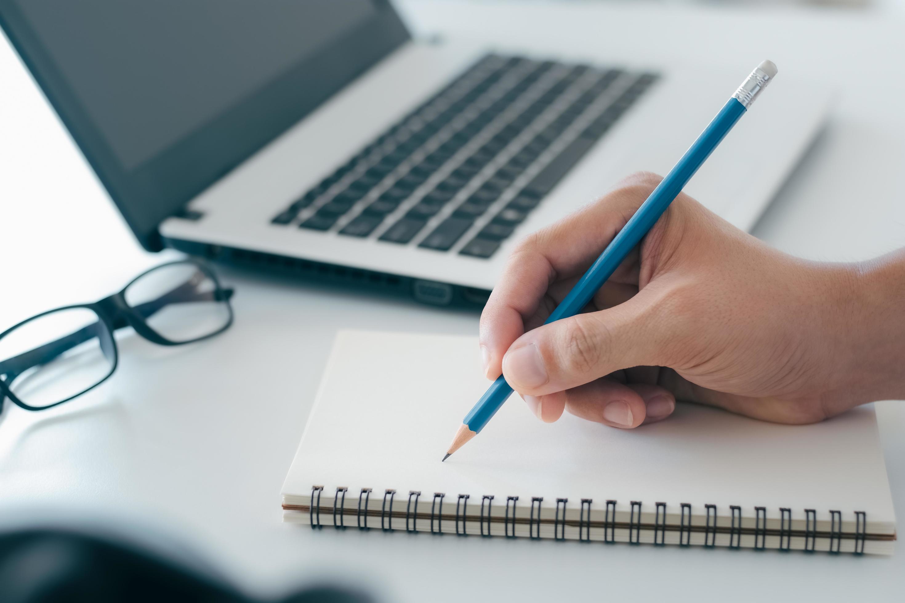 An image depicting a writer ready to write