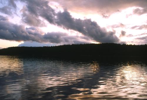 lake - A lake is a body of water surrounded by land. The majority of lakes are fresh water, and most lie in the northern hemisphere at higher latitudes. Large lakes are sometimes referred to as 'inland seas' and small seas are sometimes referred to as lakes