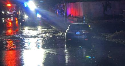 Firefighters in Tucson Arizona rescue two drivers who were trapped in floods