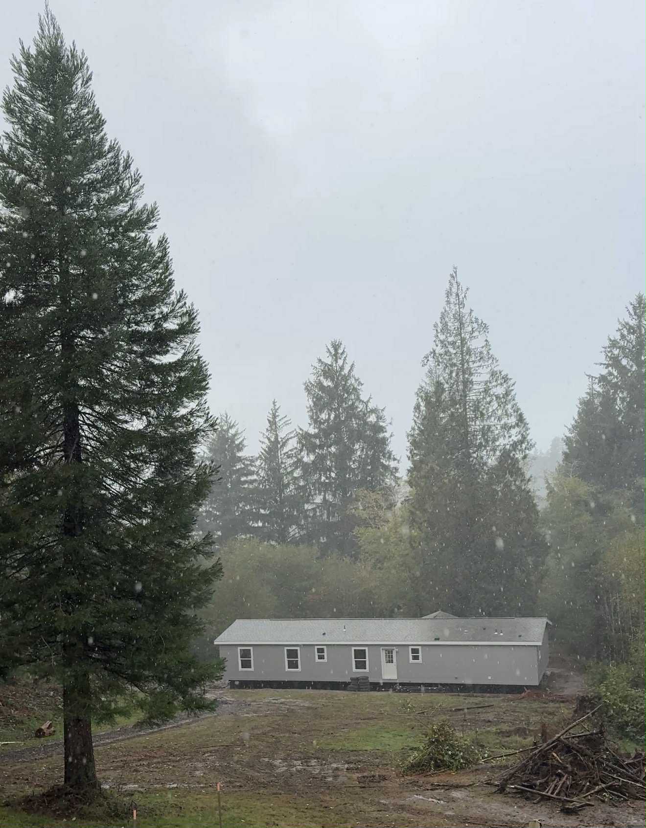 Pouring Rain New House Going In