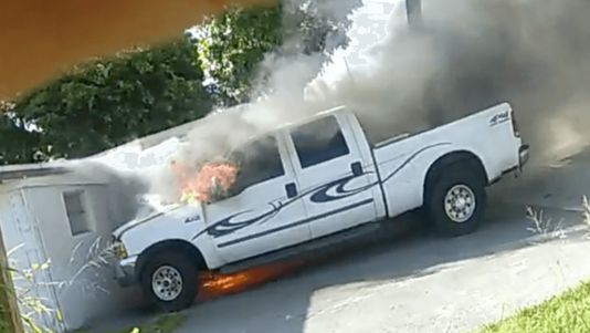 Pickup truck on fire in Riveria Beach Florida Pickup truck on fire in Riveria Beach Florida