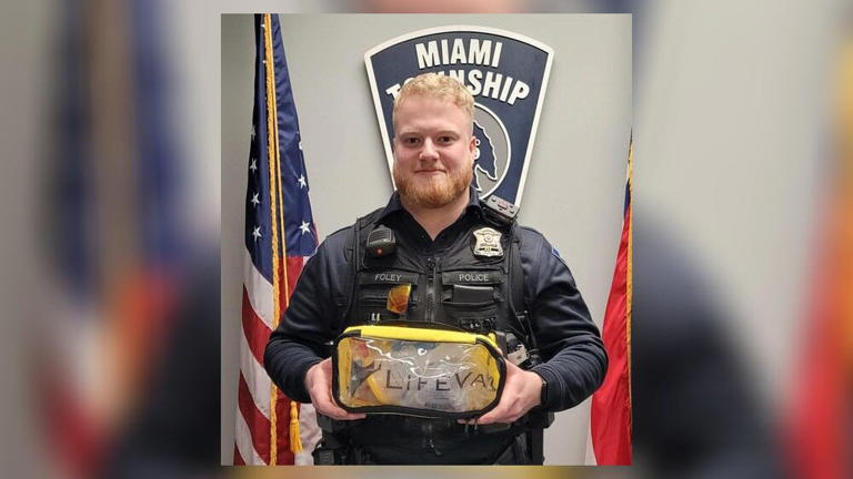 Miami Township Ohio Police Officer Foley saves the life of a choking man Miami Township Ohio Police Officer Foley saves the life of a choking man