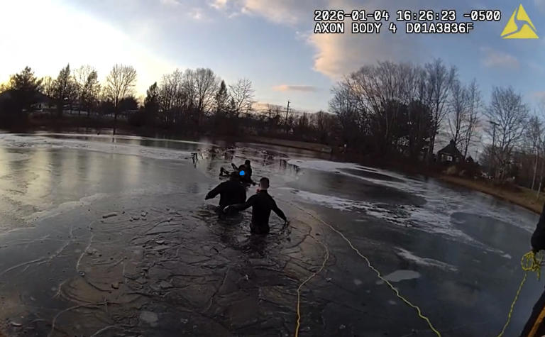 New Jersey police officers rescue a 13 year old boy who fell into an icy pond