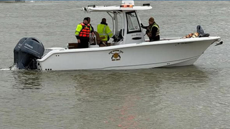 Firefighters in Seven Points send a rescue boat to save two duck hunters