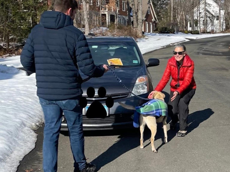 West Hartford resident Kelly Kennedy reunites with her dog Hank