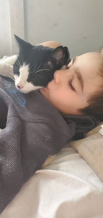 Josiah and our kitty Bandit