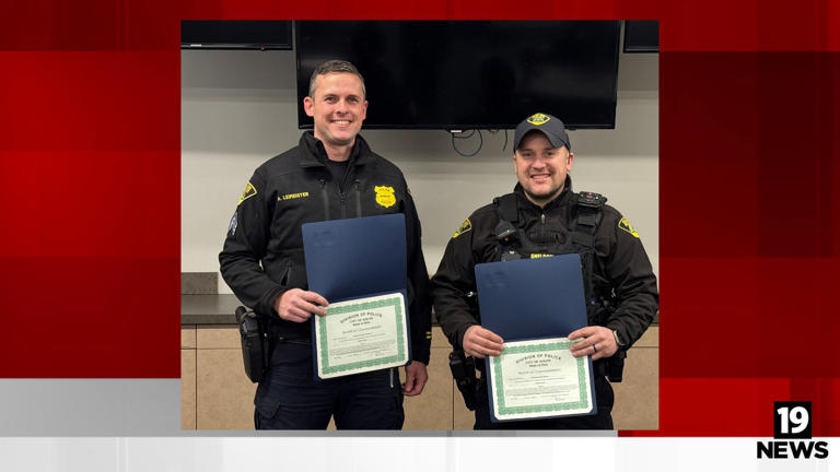 Solon Police officers with their awards for saving a life last month in Ohio