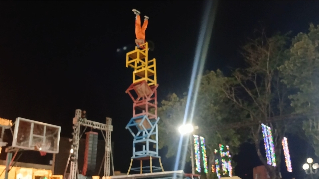 Handstanding on 6 stacks of chairs