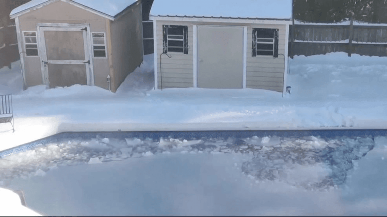 Icy swimming pool in Jacksonville Florida where a woman was in an icy pool was rescued Icy swimming pool in Jacksonville Florida where a woman was in an icy pool was rescued