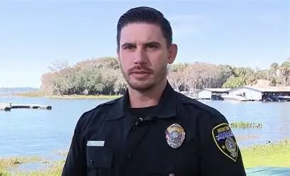 Mount Dora Police Officer Brandon Buzard risks his life to save persons who are in an accident 