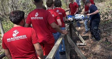 U S Marines recruits assist an injured teenager who was hiking in Texas