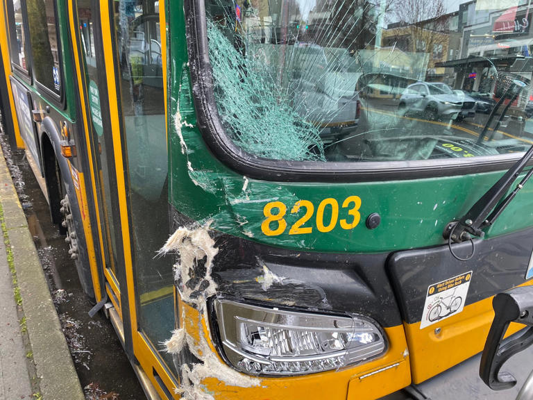 Damage to a passenger bus in Seattle Washington Damage to a passenger bus in Seattle Washington