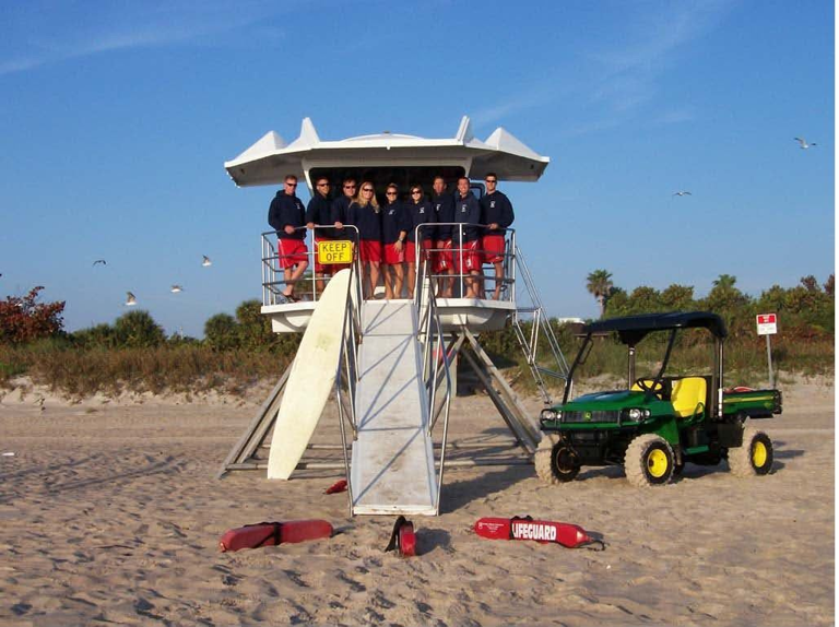 Lifeguards in Vero Beach Florida rescue a swimmer on Monday.   